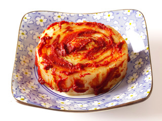 close up of a bowl of korean kimchi