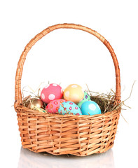 Colorful Easter eggs in the basket  isolated on white