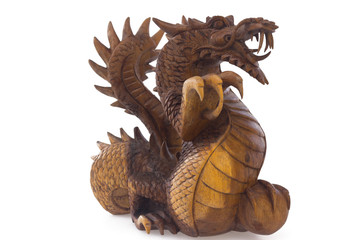 Wooden dragon, symbol of chinese new year, isolated on white