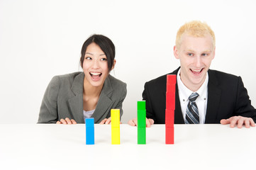 business team looking building block