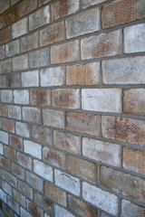 Multicoloured brick wall