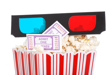 Fototapeta na wymiar closeup movie tickets popcorn and 3D glasses