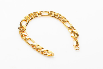 Gold bracelet isolated over white - 37882958