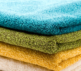 A pile of towels on white
