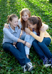 three cheerful student girls