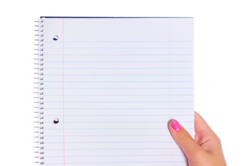 Hand Holding Lined Spiral Notebook