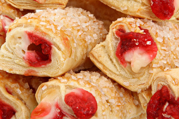 Close up Raspberry Filled Pastries with Sprinkles