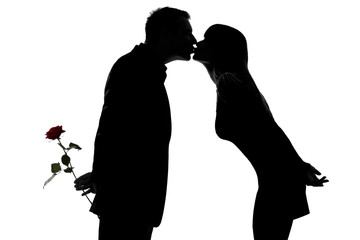 one couple man hiding rose flower and woman kissing