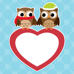 Winter card with couples of owls on red heart