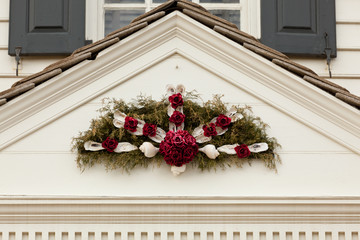 Traditional xmas wreath above front door