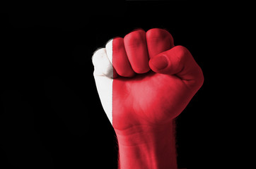 Fist painted in colors of bahrain flag