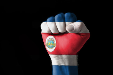 Fist painted in colors of costa rica flag