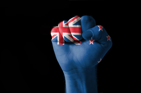 Fist painted in colors of new zealand flag