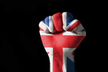 Fist painted in colors of great britain flag