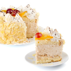 Close-up of a creamy cake with fruits and almonds