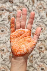 Hand decorated with traditional henna tatoo