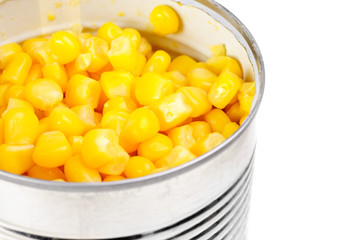 opening can with corn isolated on the white