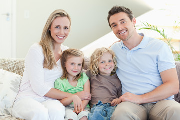 Fototapeta premium Happy family on the couch