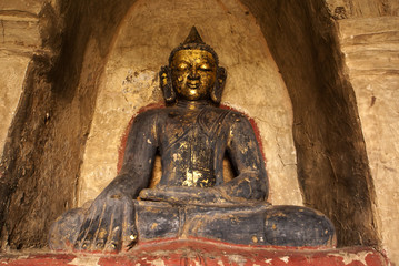 Buddha statue inside the Htilominlo Pahto, Bagan, Myanmar (Burma)