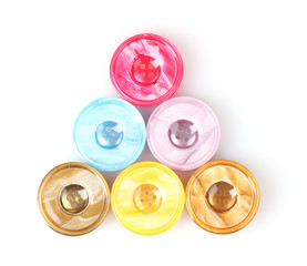 Bright sewing buttons isolated on white