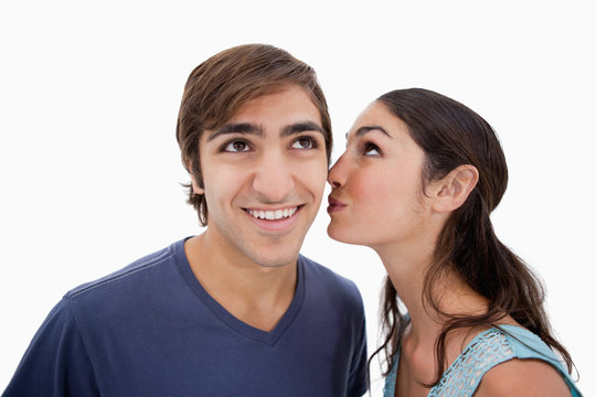 Lovely woman whispering something to her fiance