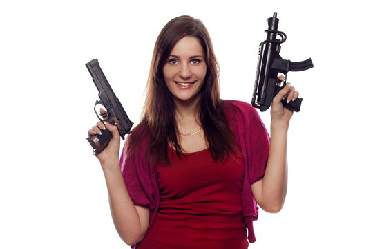 Young Pretty Woman With Two Guns