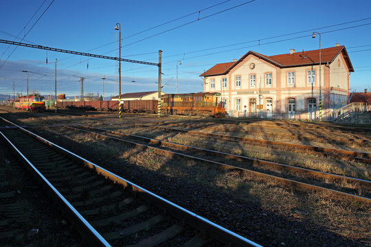 An old train station against a deep blue sky
