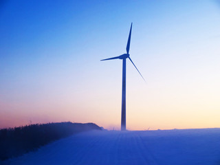 Alternative energy wind mills in the snow digital art manipulati