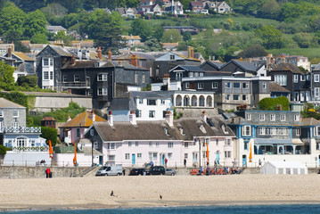 Stacked houses and beach, Lyme regis Dorset, UK