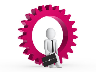 Businesmann sitzt im zahnrad