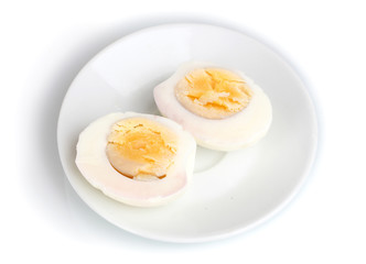 Fototapeta na wymiar tasty boiled eggs on plate isolated on white