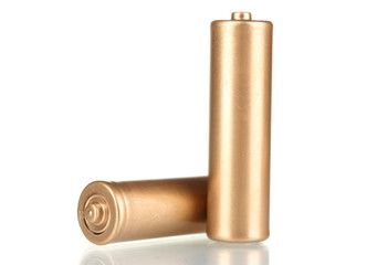 two golden batteries isolated on white