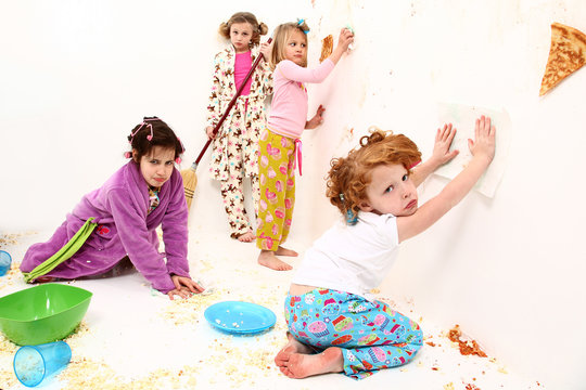 Children Clean Up After Food Fight at Pajama Party