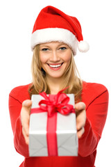 Young woman giving christmas gift