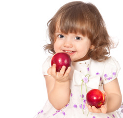 Fototapeta na wymiar portrait of a little girl eating apples