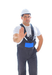 Male builder making stop sign