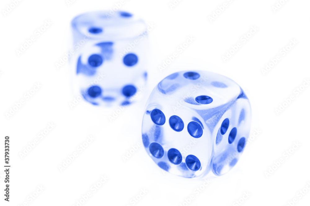 Wall mural pair of glass dice against white background