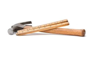 Old wooden rule and hammer.