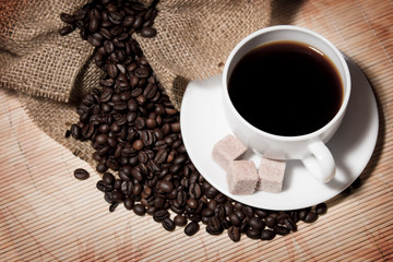 Сoffee beans and a cup