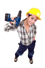 Tradeswoman holding a power tool