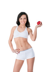 Yound fit girl holding red apple