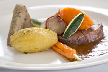Close-up of steak meal in gourmet restaurant