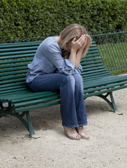 young woman crying discreetly