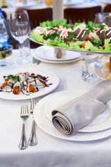 Grilled salmon fish in a dish on the dinner table