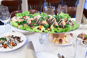 Grilled salmon in a dish on the dinner table