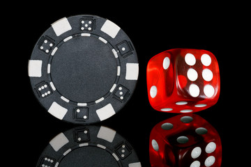 black poker chip with dice