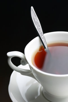 full tes cup with spoon