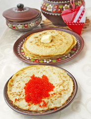 Pancake with red caviar