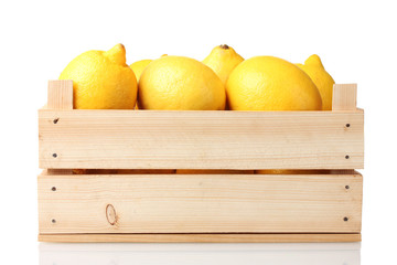 ripe lemon in wooden box isolated on white - Powered by Adobe