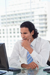 Fototapeta premium Portrait of a businessman thinking